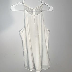 White tank, lace back blouse.